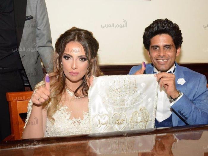 حمدي الميرغني وإسراء عبدالفتاح
